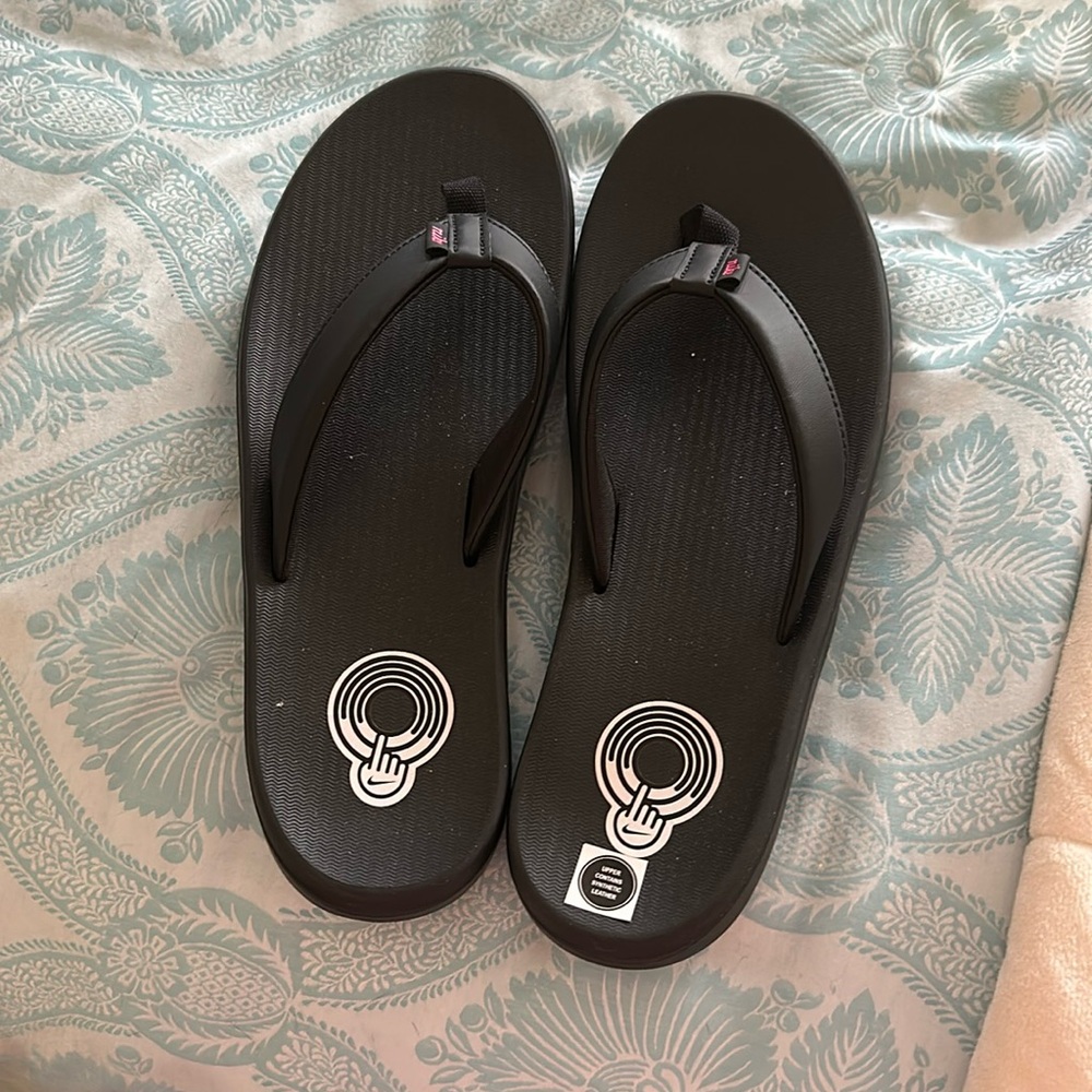 Brand new Nike flip flops